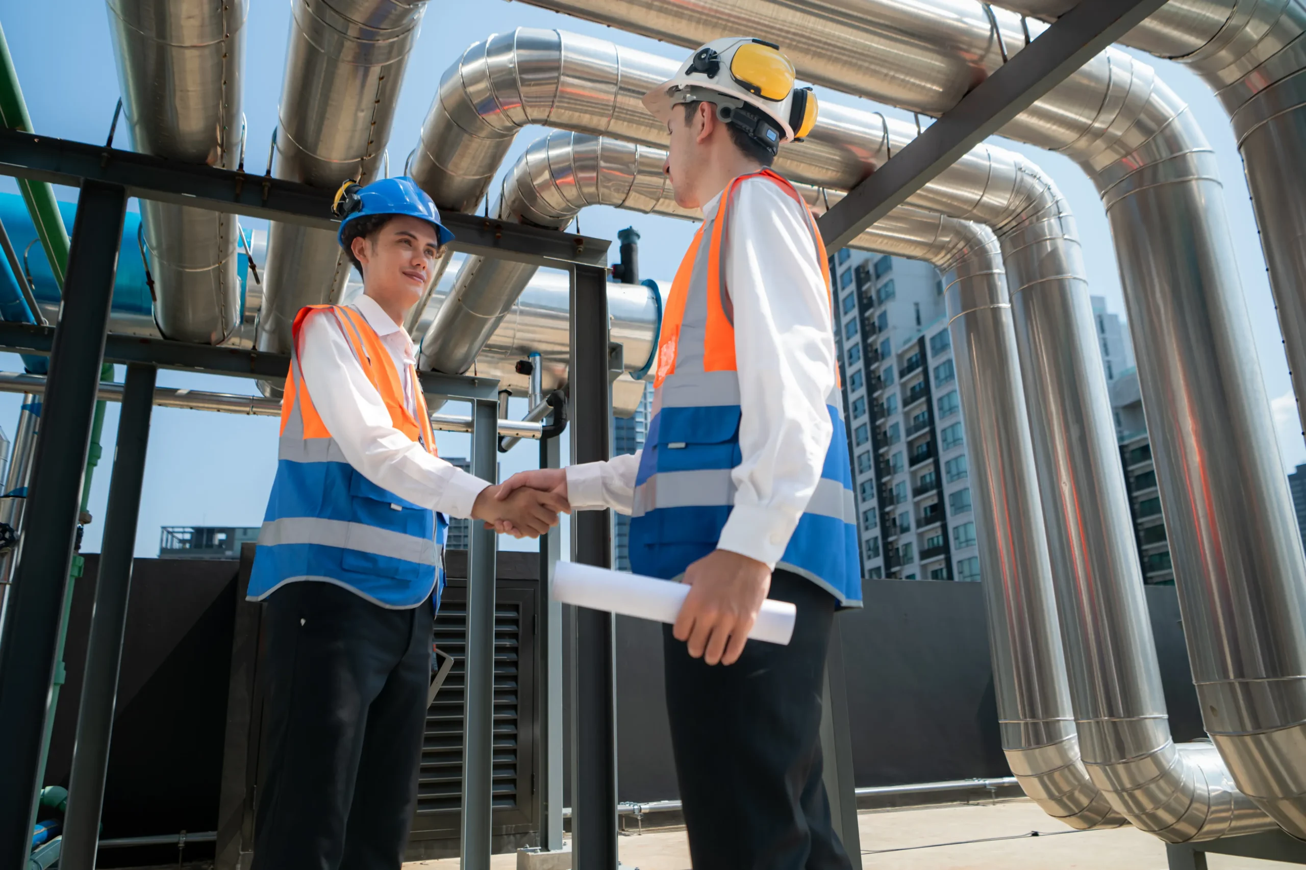 engineers-collaborate-handshake-on-industrial-con-2026-01-07-00-27-04-utc